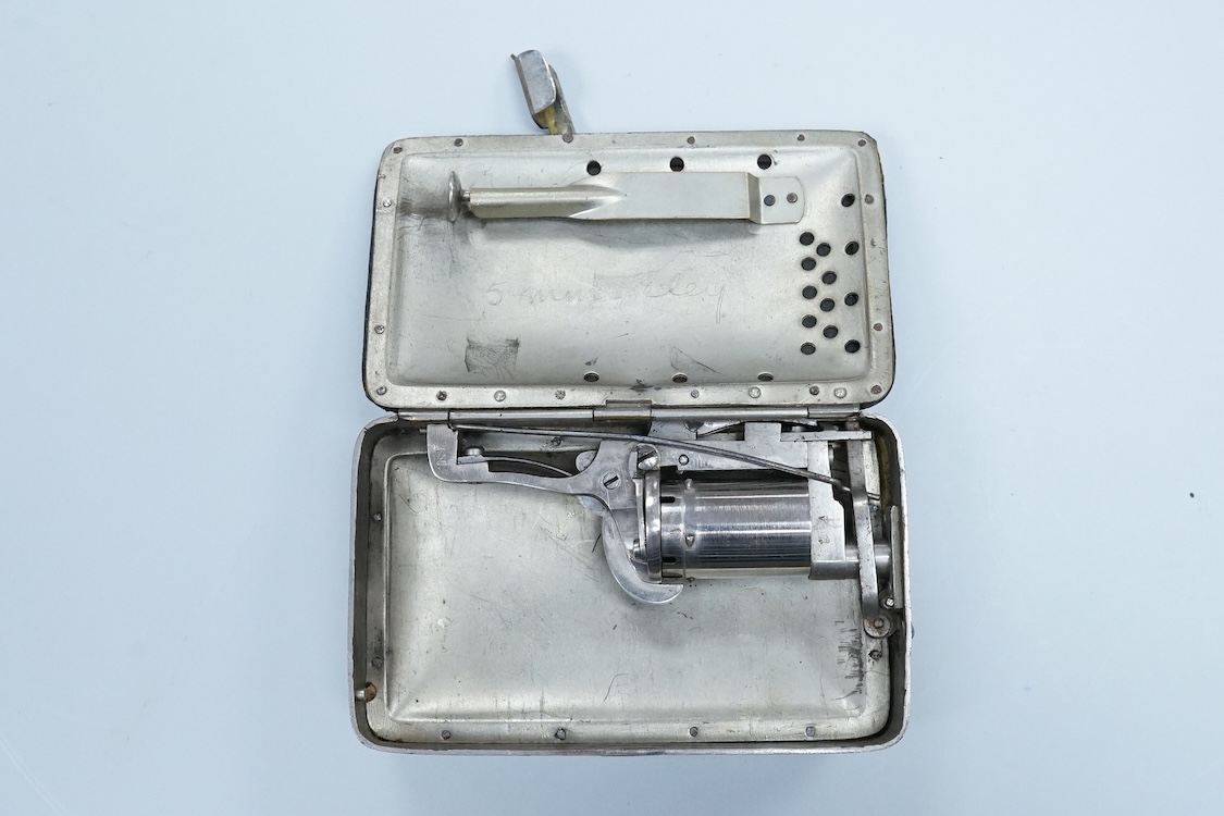 A five shot, 5mm self cocking pinfire Frankenau patent revolving purse pistol, London and Continental proof marks, lid engraved; ‘5mm Eley’, complete with ejector rod